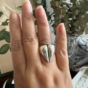 Sterling silver minimalist designed ring shaped like a tooth